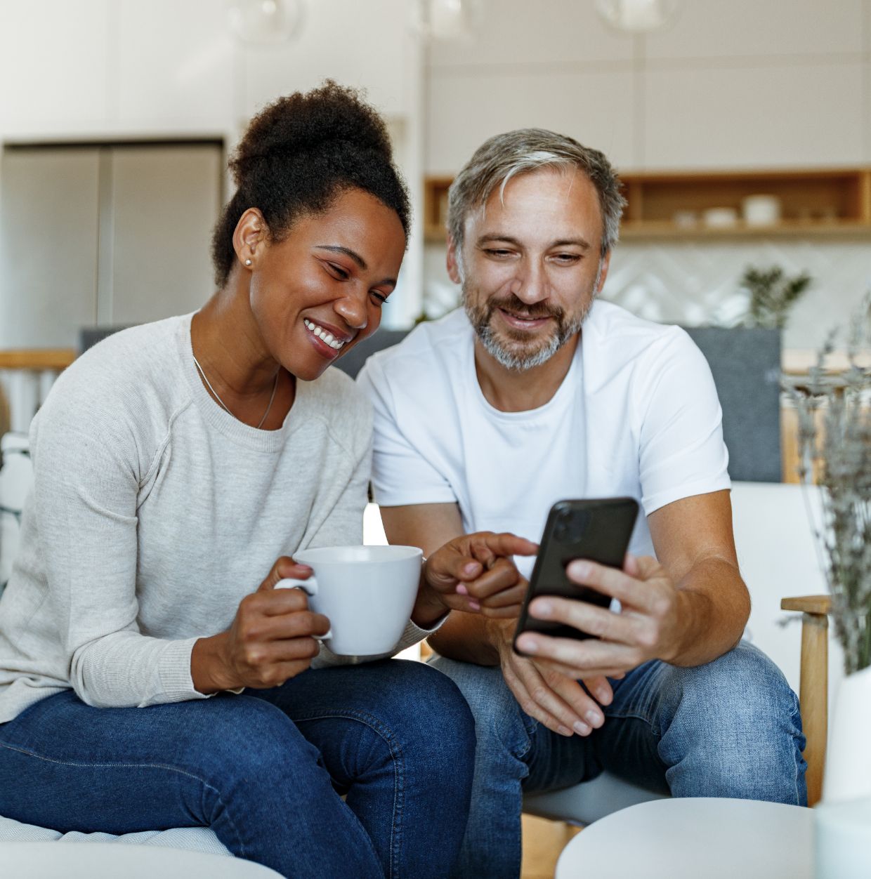 A couple checking their repayments